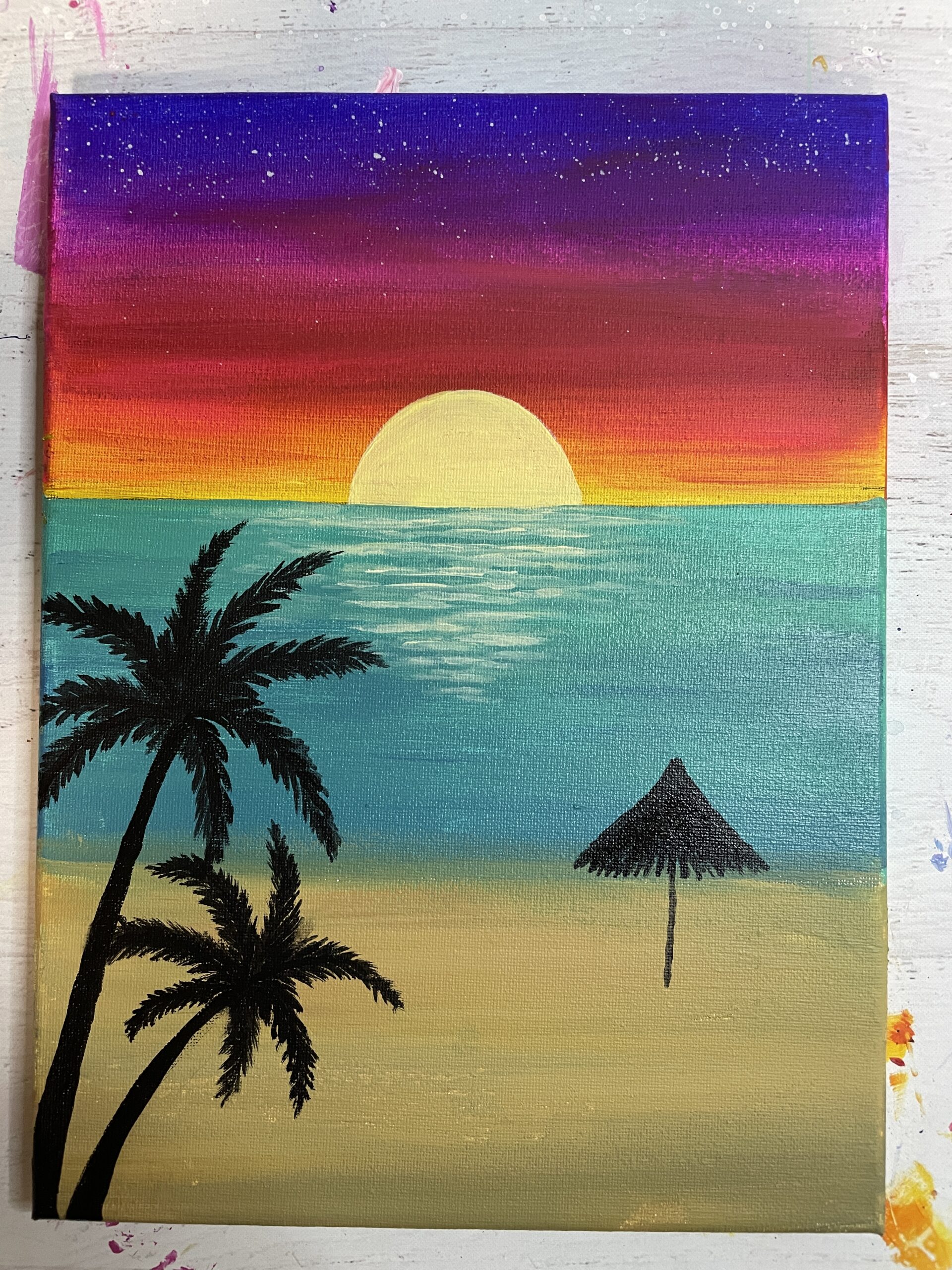 beach umbrella and chairs silhouette painting